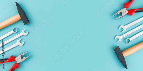 Working tools on a blue background. Father's day celebration concept. Copy plasticity for text.
