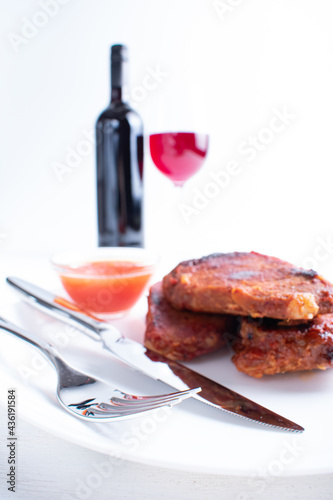 Roasted Beef or Pork steaks on plate