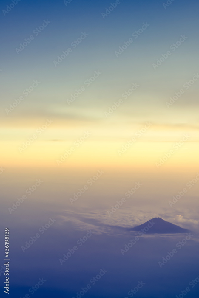 Beautiful aerial view on a mountains or volcano from the plane