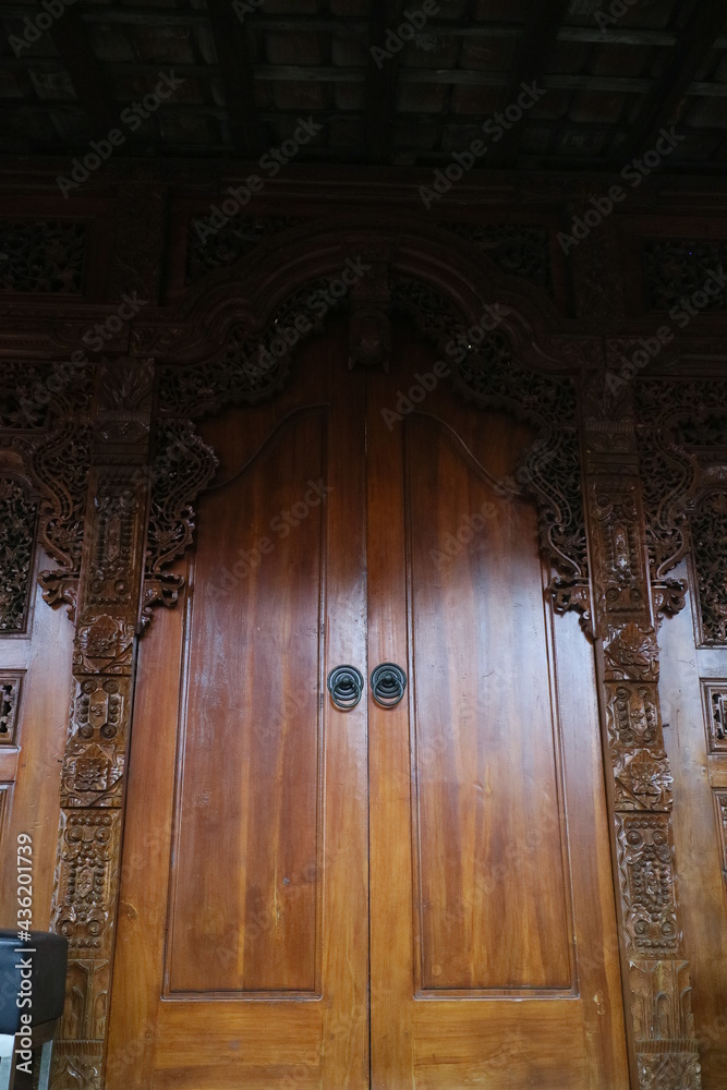 ancient wooden doors with beautiful carvings ancient wooden doors with beautiful carvings