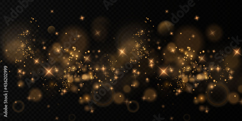 Bokeh light lights effect background. Christmas background of shining dust Christmas glowing golden bokeh confetti and spark overlay texture for your design. Gold dust PNG.
