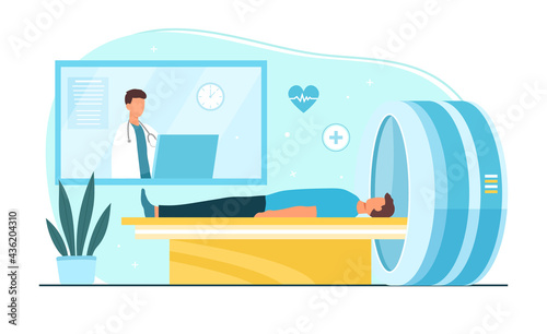 Male doctor is doing brain scan on MRI machine for patient