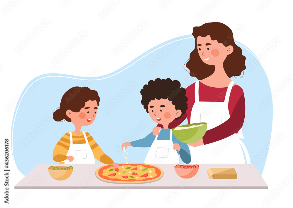 Young mother is helping little son and daughter to cook pizza in the kitchen Young mother is helping little son and daughter to cook pizza in the kitchen