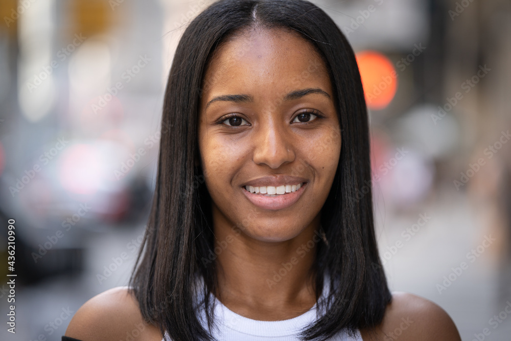 Young black woman in city smile happy face portrait