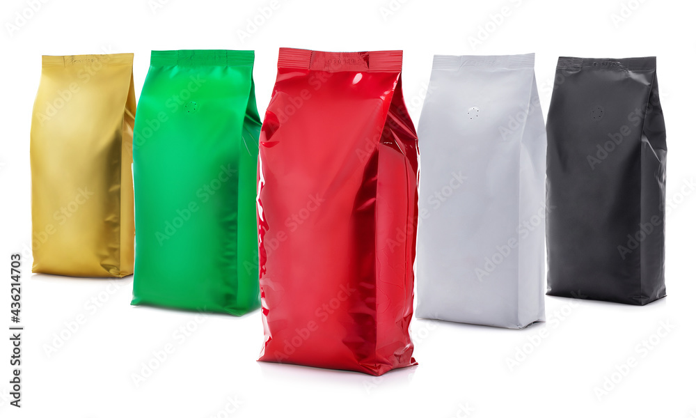 Set of multicolored bright packs of coffee. Mockup Vacuum packs isolated on white background