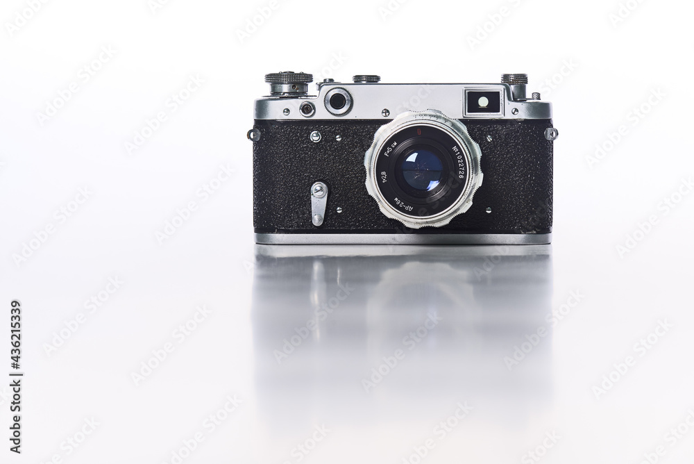 A Retro camera of classic design against a White Background A Retro camera of classic design against a White Background