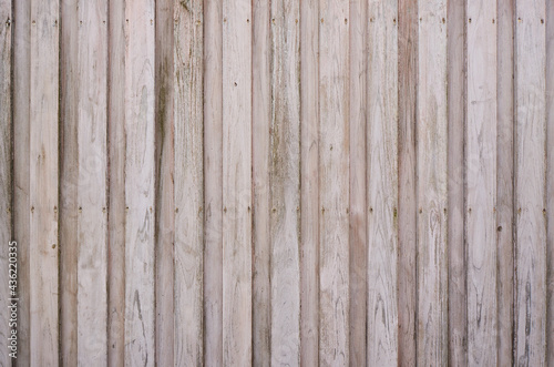 White and pink rustic wood wall background 