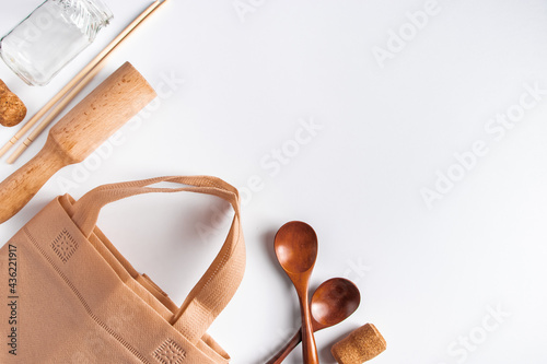 Zero waste concept. Set recycled home accessories - eco-friendly bags and wooden supplies