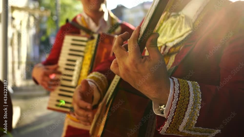 Mexican musicians mariachi band street concert	