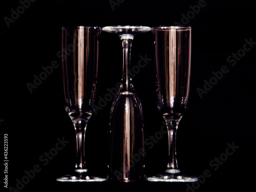 champagne glasses on black background