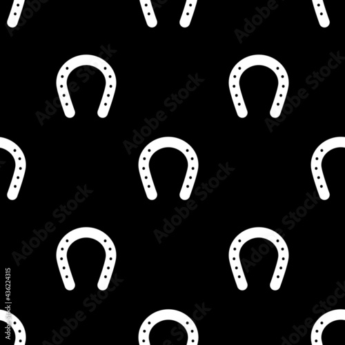 Horseshoe seamless pattern on black background. Vector illustration.