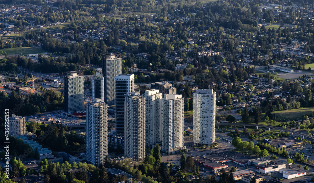 Aerial View from an Airplane of Residential Homes and Buildings near Surrey Central Mall. Greater Vancouver, British Columbia, Canada.
