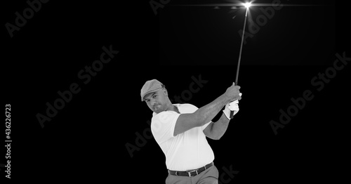 Composition of male golf player with golf club with copy space in black and white