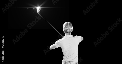 Composition of caucasian female golf player with golf club and copy space in black and white