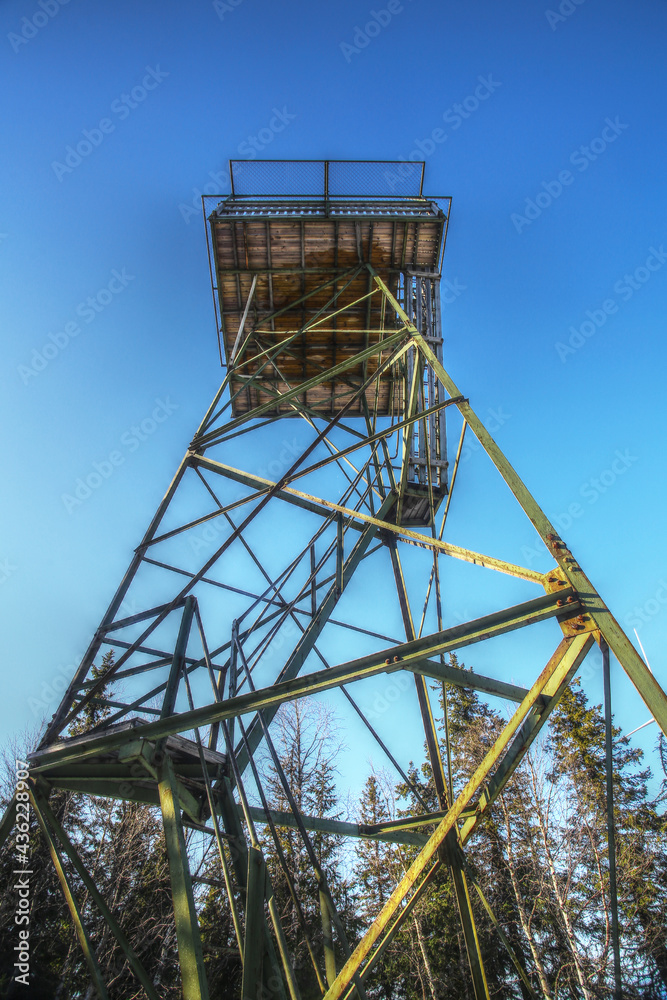 Upward view on old lookout tower in Sweden