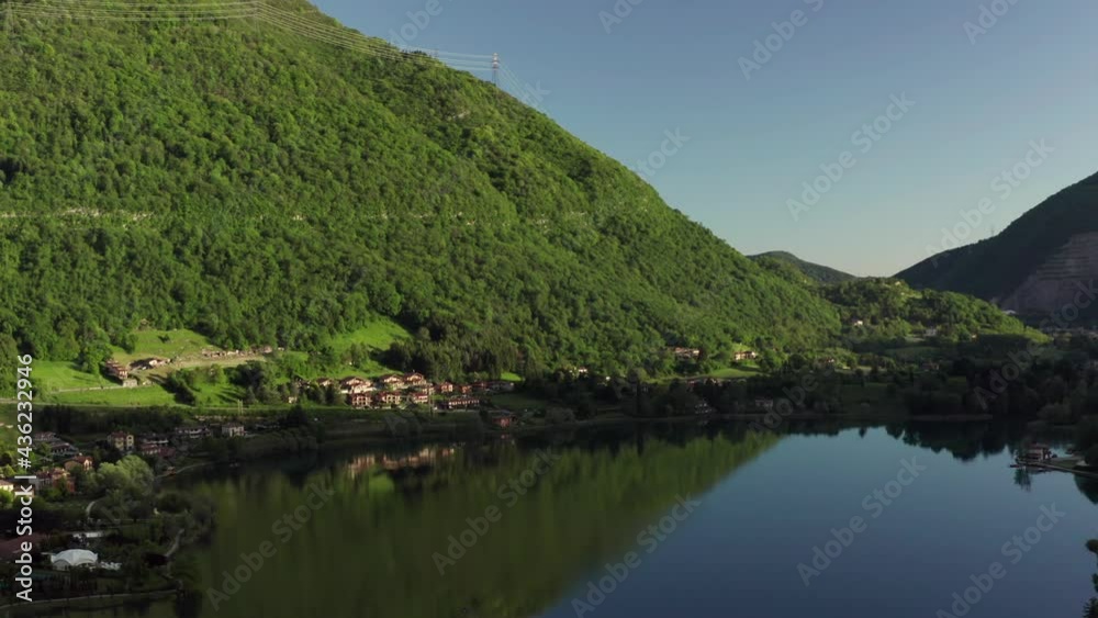 Drone flying over Lake Endine with the mountains in the background,Lombardy,Italy. Drone flying over Lake Endine with the mountains in the background,Lombardy,Italy.