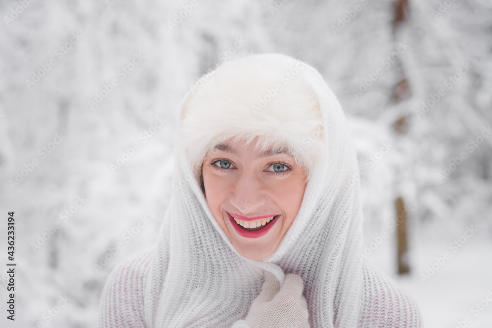 Beautiful girl in winter snowy forest in christmas clothes Beautiful girl in winter snowy forest in christmas clothes