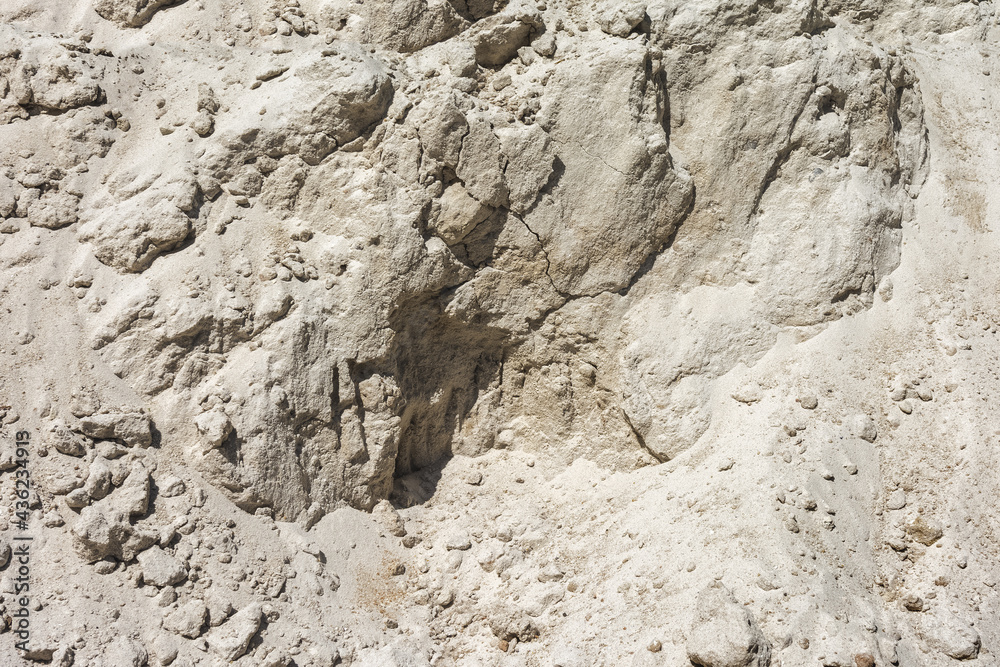 Sand quarry. Vertical wall of an abandoned quarry. As a natural background and texture. Sand quarry. Vertical wall of an abandoned quarry. As a natural background and texture.