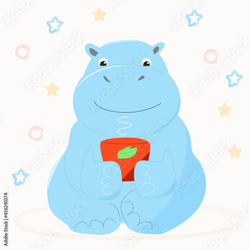 A blue hippo is drinking a hot drink from a red mug.