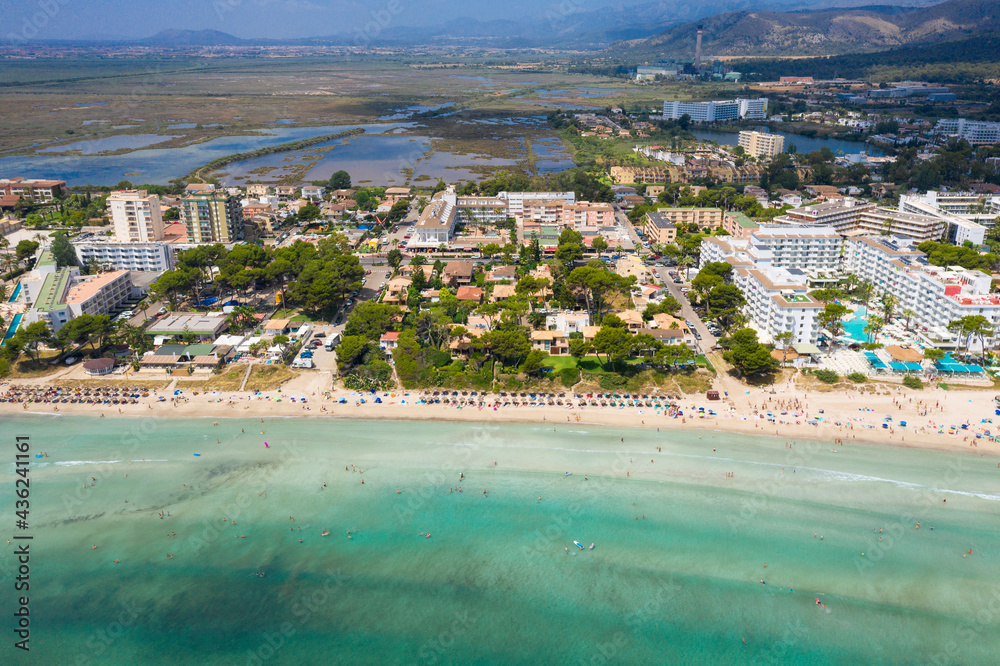 An aerial panoramic view on Playa de Muro beach on Mallorca island in Spain An aerial panoramic view on Playa de Muro beach on Mallorca island in Spain