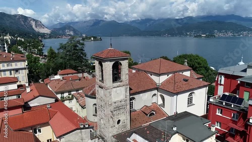 Low altitude aerial view of Stresa is a town and comune of about 5,000 residents on the shores of Lake Maggiore in the province of Verbano Cusio Ossola in the Piedmont region of northern Italy 4k photo