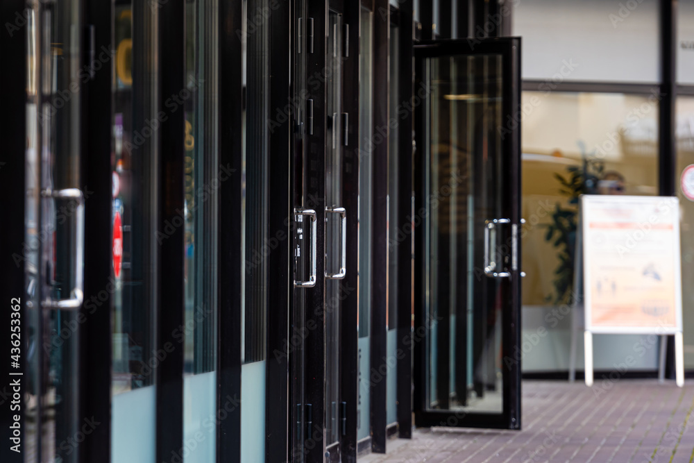 row of glass doors in an office building