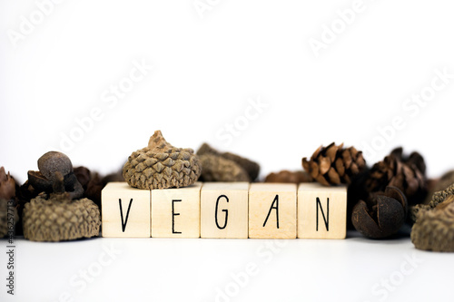 Vegan concept and veganism lifestyle, Vegan text on white background eating green biological natural food with copy space