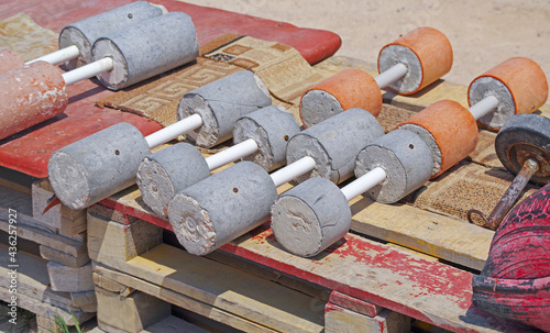 Authentic homemade sports dumbbells made of concrete
