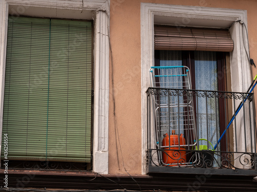 POOR NEIGHBORHOOD STREET WITH CLOTHES AND GARBAGE photo