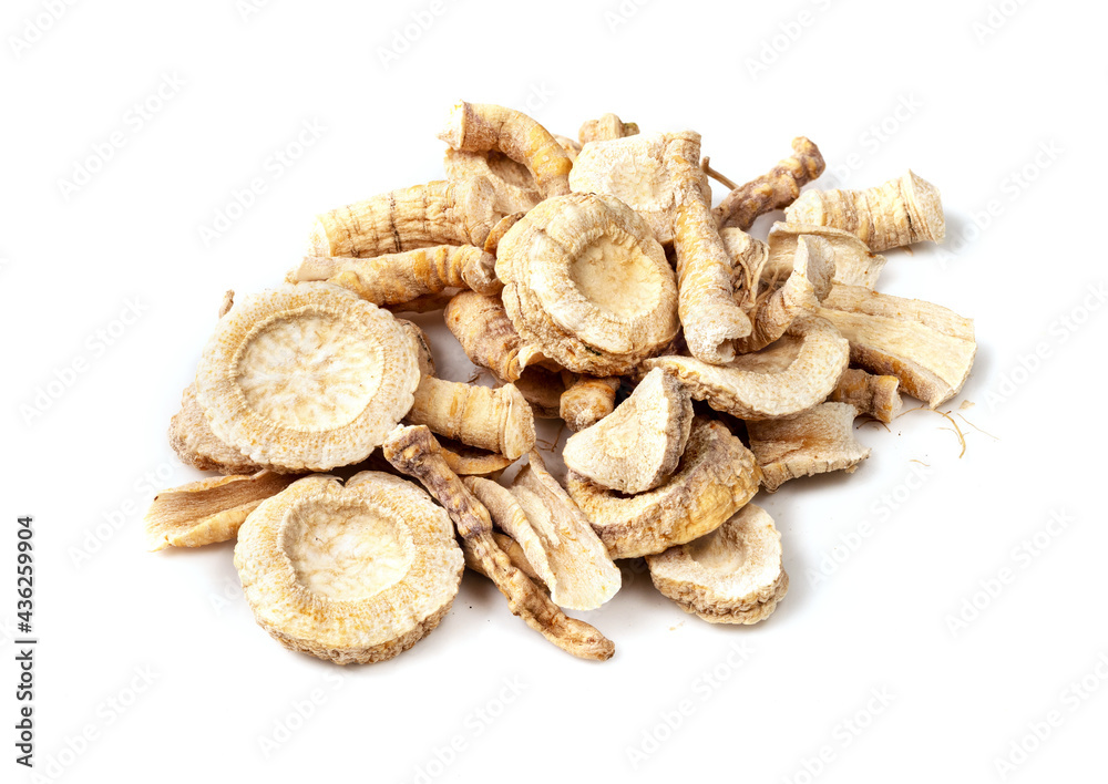 handful of dried parsley roots closeup on white handful of dried parsley roots closeup on white