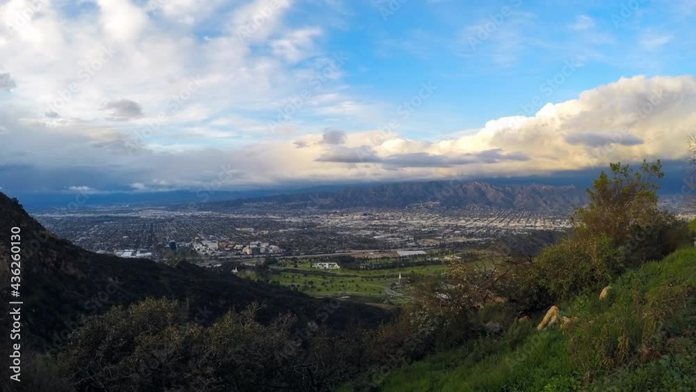 Lockdown Time Lapse Shot Of City By Mountains Against Cloudy Sky During Sunset - Los Angeles, California