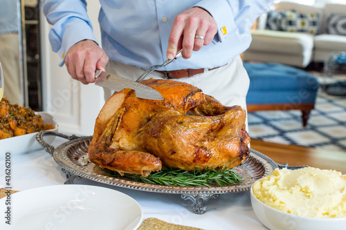 Man carving turkey 