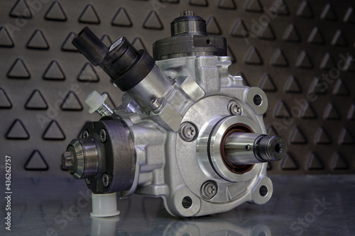 Close-up of a new original high-quality fuel injection pump. Selected focus.