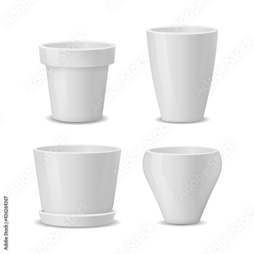 Set of realistic white ceramic flower pots.