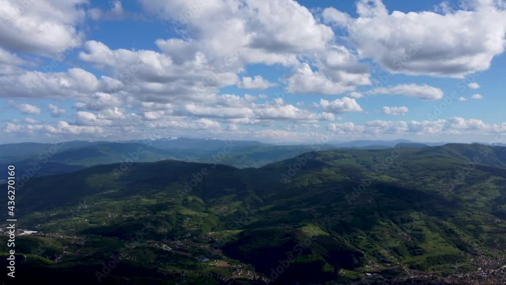 Aerial drone view of mountains and lowlands. Panoramic view from mountain. Aerial drone view of mountains and lowlands. Panoramic view from mountain.