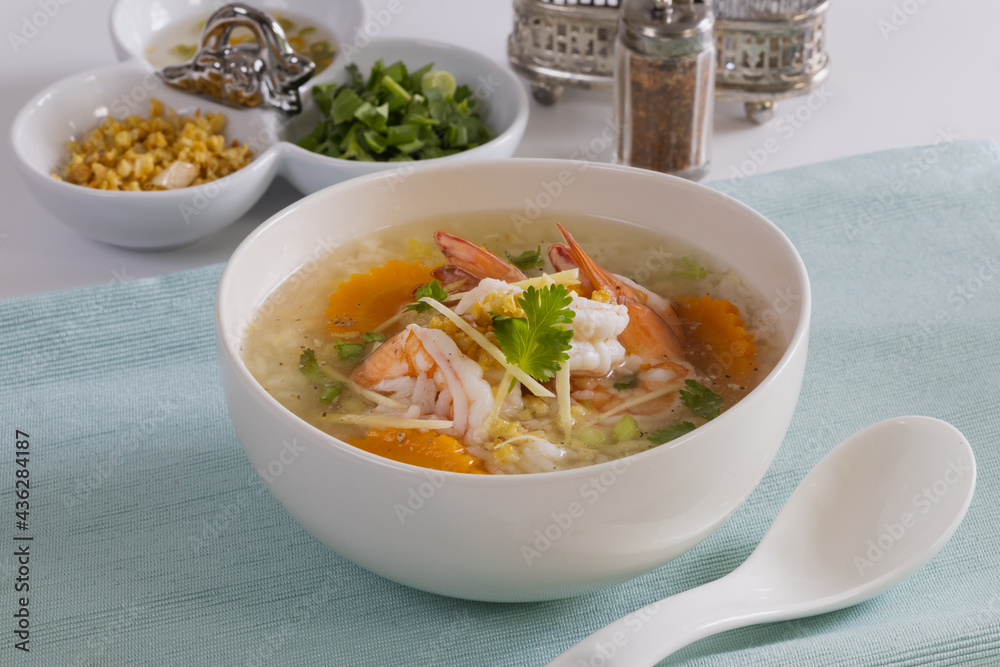 Shrimp porridge white bowl on the table Shrimp porridge white bowl on the table