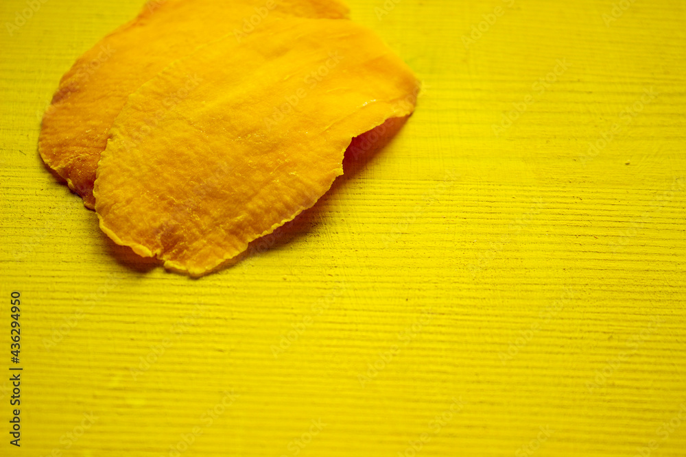 Fototapeta premium Dried mango closeup isolated on white background.