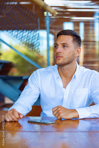 European business man in a cafe