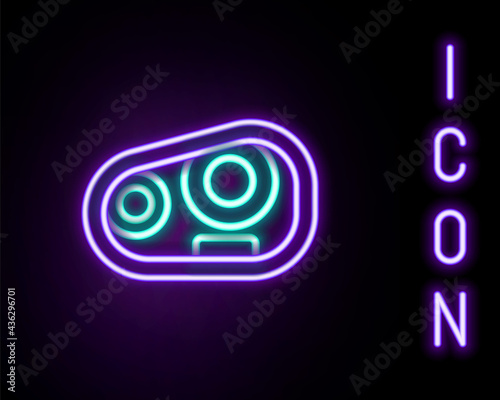 Glowing neon line Car headlight icon isolated on black background. Colorful outline concept. Vector