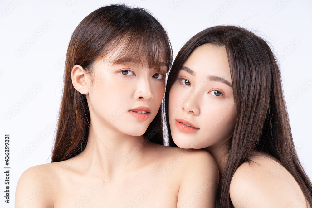 Beauty portrait of two beautiful young Asian girls Beauty portrait of two beautiful young Asian girls