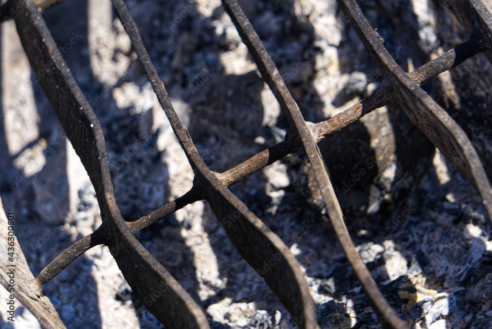 Fototapeta premium Broken, crooked outdoor bbq grid 