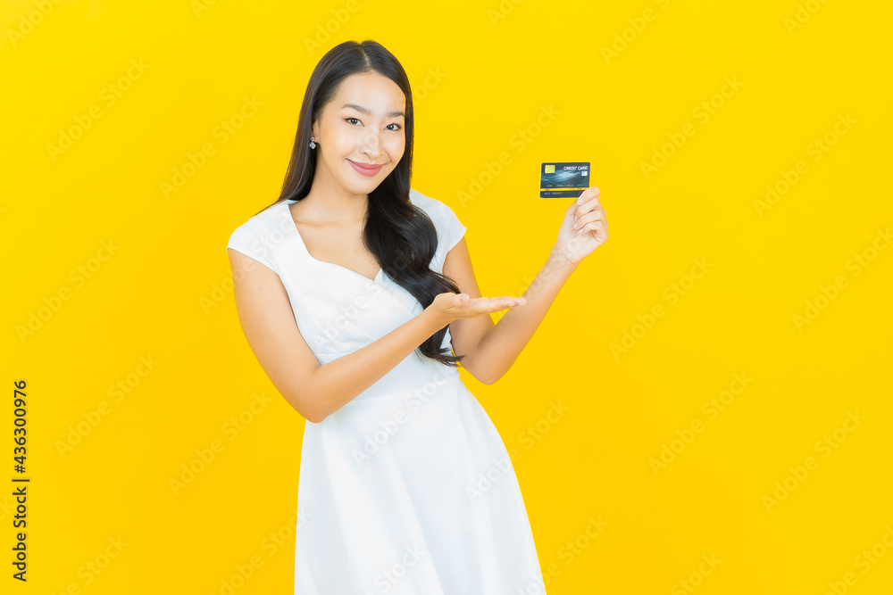 Portrait beautiful young asian woman smile with credit card Portrait beautiful young asian woman smile with credit card