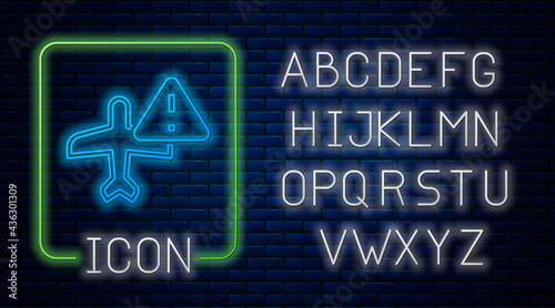 Glowing neon Warning aircraft icon isolated on brick wall background. Faulty plane. Flying prohibition zone. Plane is forbidden for transportation and travelling. Neon light alphabet. Vector