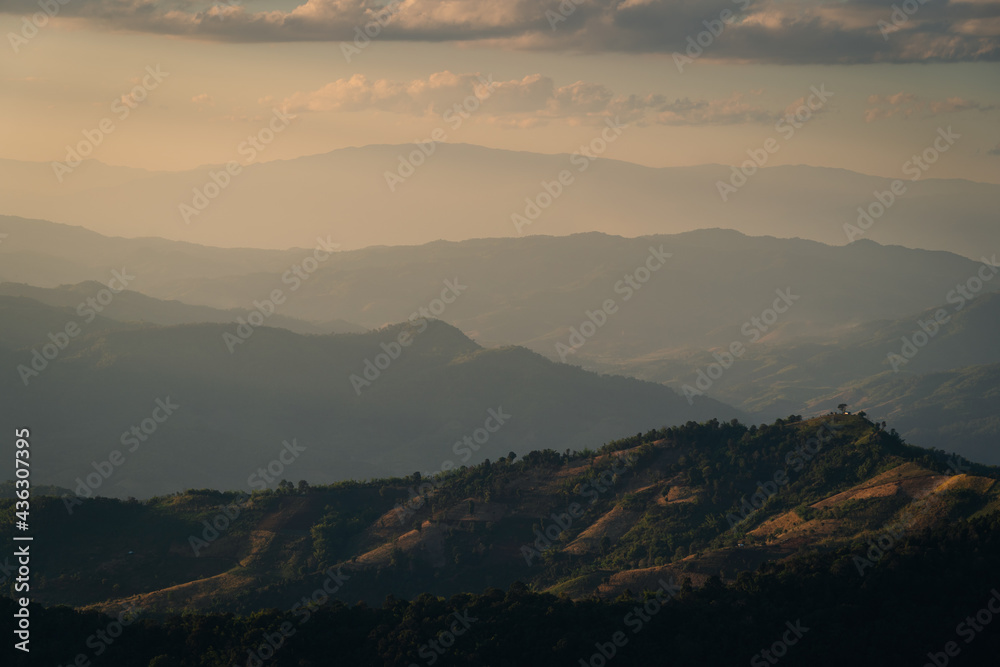 Beauitful sunset over Doi Chang in Chiang Rai province, Thailand