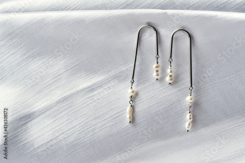 Creative dangle earrings with small pearls