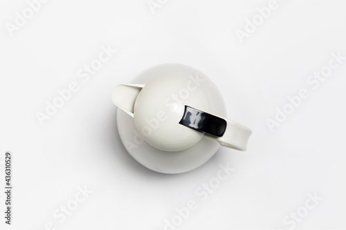 Modern white electric kettle isolated on white background. Mockup. High-resolution photo.