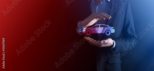 Quadro su tela Digital composite of Man holding car icon