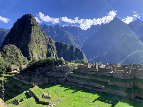 Machu Picchu great Inca lost city in Peru. Ancient Incas fortress in Andes mountains.  Panorama of Huyana Picchu Mount. Ancient civilization landmark in South America.. photo