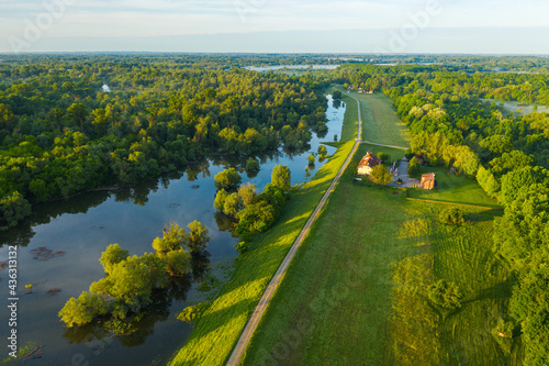 Aerial view of hunter lodge Zlatna greda and the dike on the Danube and its floodplain, Croatia photo