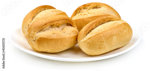 Freshly baked rustic buns, French rolls, isolated on white background. High resolution image